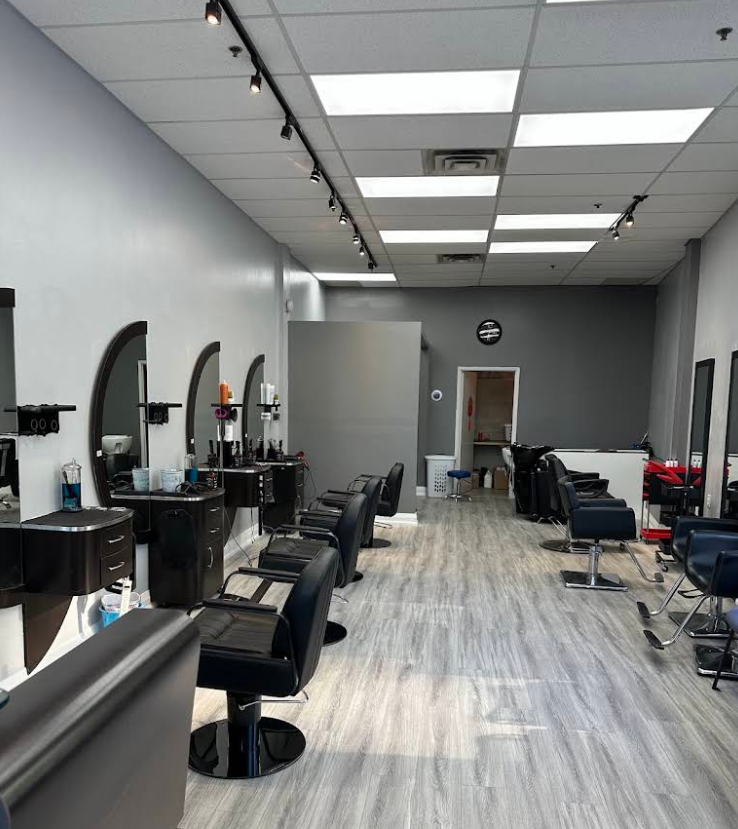 Inside A&T Hair Salon — styling stations along the wall